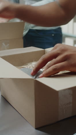 team packing and shipping boxes