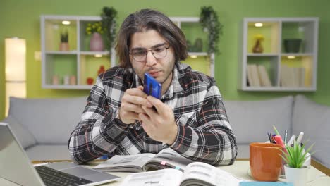 The-young-man-whose-phone-charge-runs-out-gets-angry.-Phone-addiction.