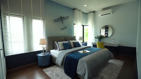 chic blue and white bedroom interior design, fully furnished