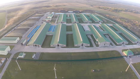 Flying-over-the-farm-facilities-at-sunset