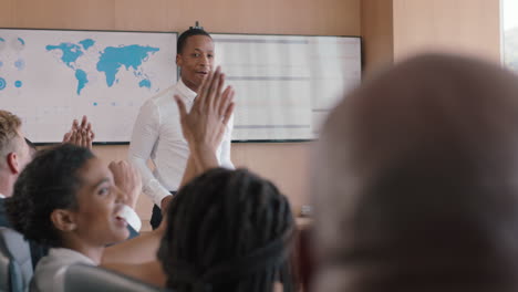 businessman presenting successful solution to shareholders celebrating with applause congratulating executive for growth in sales clapping hands in office boardroom meeting