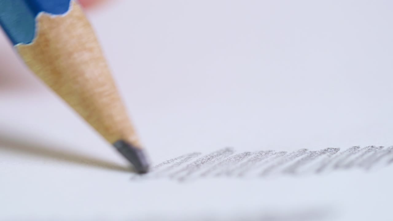 A close-up view of a pencil sketching capturing the artistic process an indoor workspace