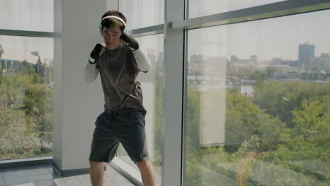 man boxing training in a modern gym