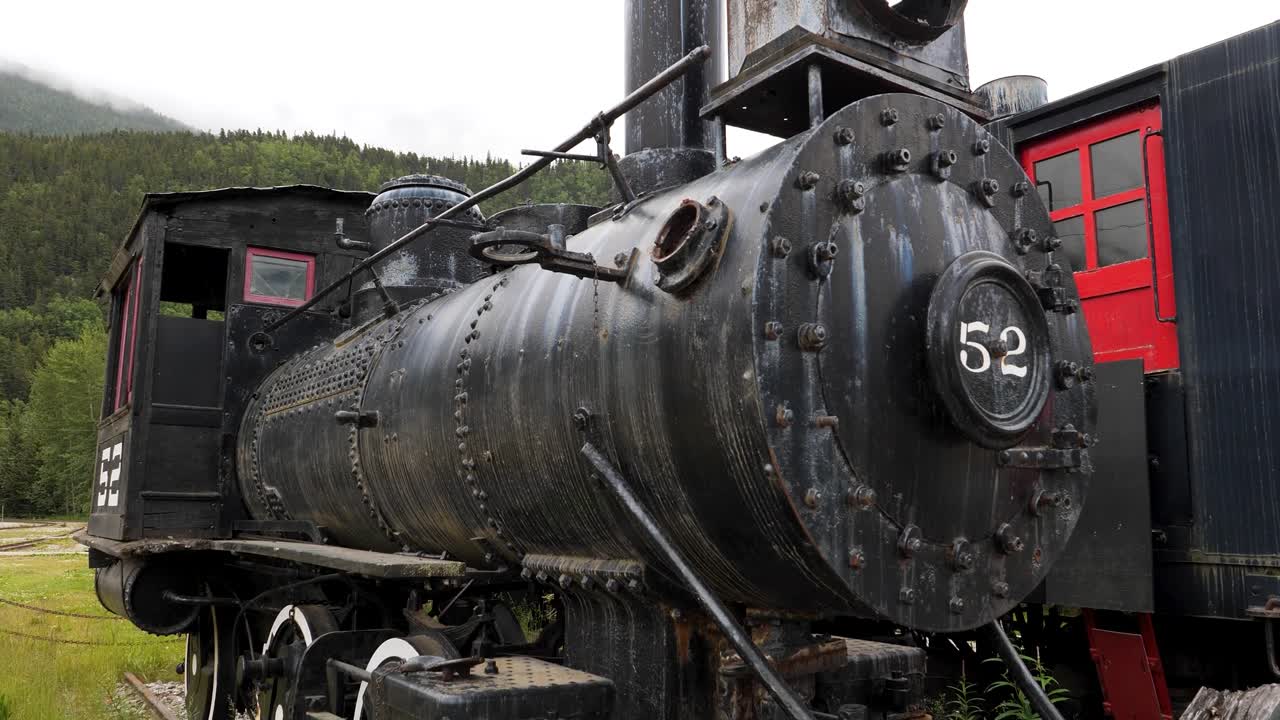 Engine No. 52 on display, alongside Rotary No.1 behind the Skagway Depot, Alaska. Engine No. 52 was the first locomotive on the White Pass and Yukon Route.