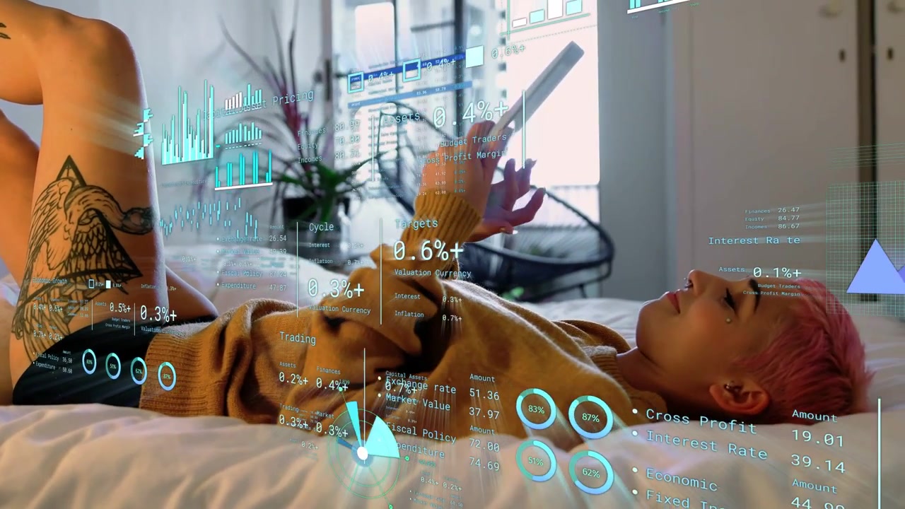 Woman reclining on bed shifting posture by tapping tablet and animating financial holograms