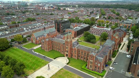 rising aerial video of queen's university in belfast, northern ireland in the uk. filmed in 4k, 30fps and with rec709 color
