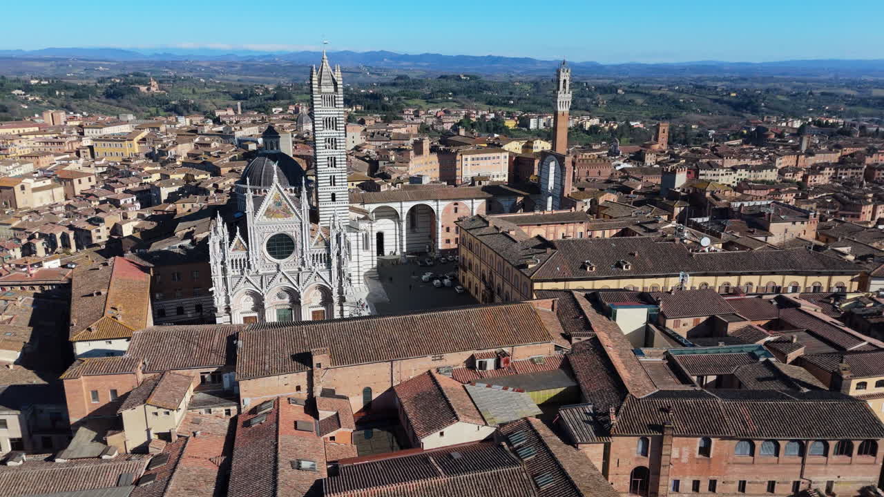 Majestic aerial view of Siena’s Duomo, historic rooftops, and iconic landmarks