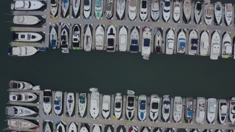 a beautiful aerial birds-eye view drone shot, flying over the dana point harbor, dana point - orange county - california