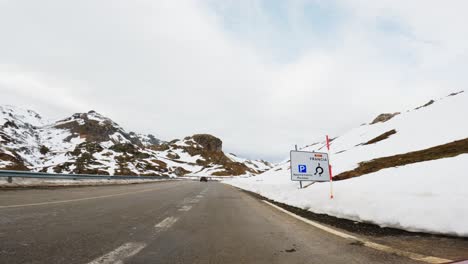 snowy mountain road in the alps