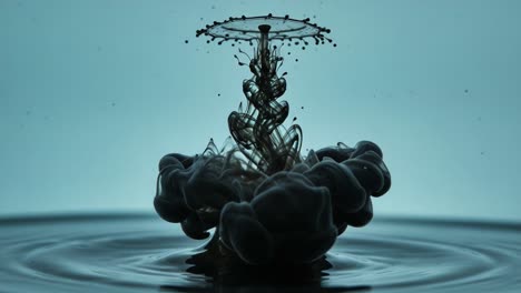 an intricate water drop collision creating stunning patterns in a calm surface, captured in two dramatic frames of fluid dynamics and aesthetic elegance