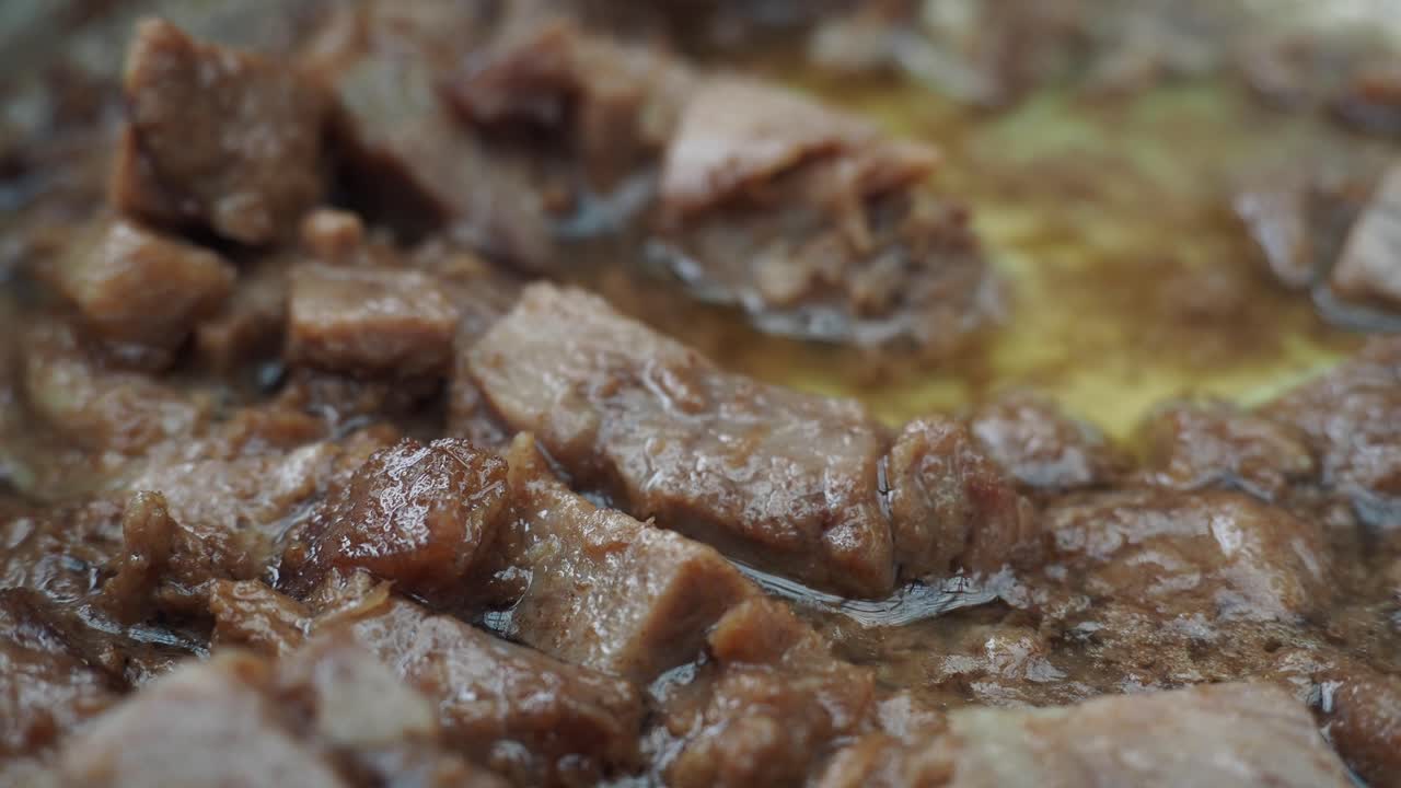 Sliced Beef Cooking in Pan