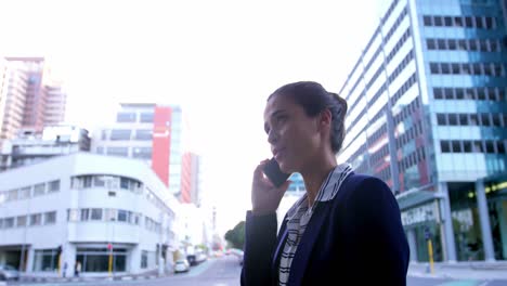 Businesswoman-talking-on-mobile-phone