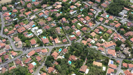 Nice-residential-neighbourhood-with-houses-gardens-and-pools-aerial-view-France