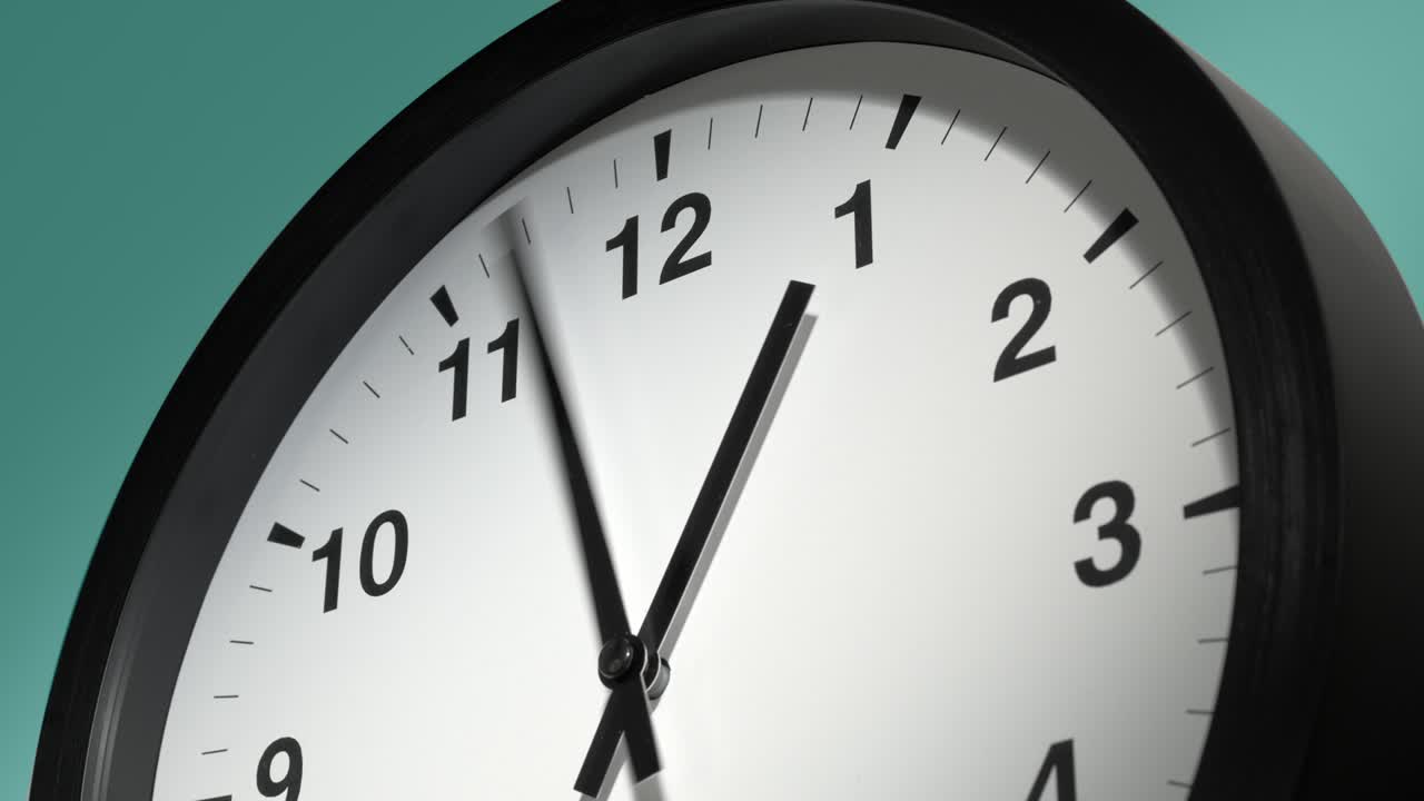 Clock Face on Cyan Blue Aquamarine Celadon Sea-Green Wall in Time Lapse
