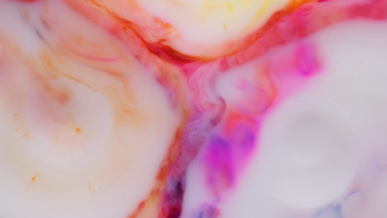Soft pastel alcohol ink blending in dreamy abstract macro flow