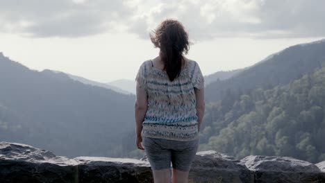 middle aged woman looking at mountain view in the great smoky mountains national park in slow motion