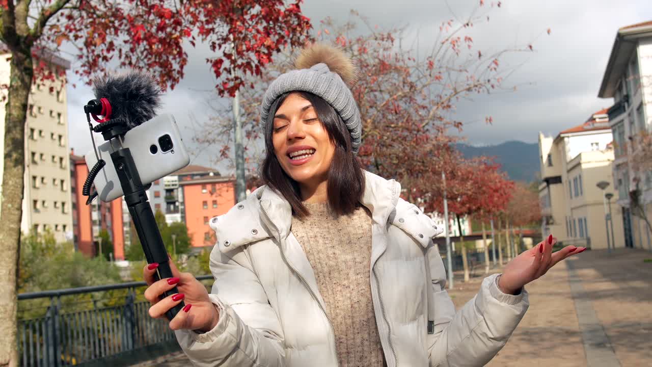 Woman Vlogging Outdoors in the City