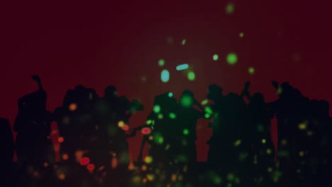 animación de puntos coloridos de luz sobre la multitud bailando con fondo rojo