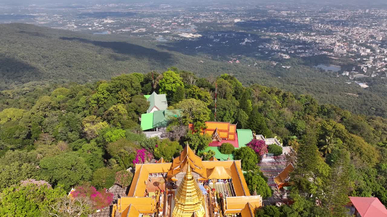 Reveal of gold decorated temple on hill in Chiang Mai, Thailand. Place of worship, Buddhism.