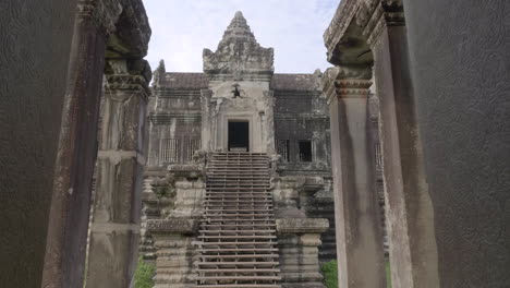 dolly push in of angkor wat temple stair ruins in siem reap, cambodia