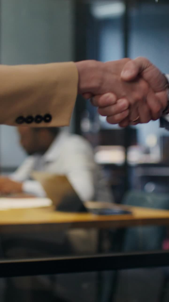 Business Handshake in Office