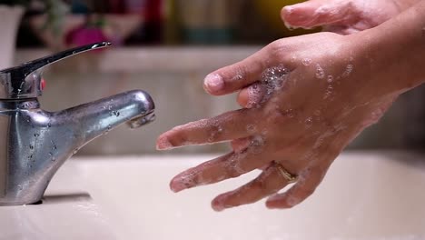 washing hands with soap and water