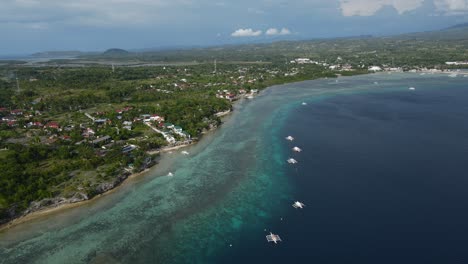 cebu island phillipines aerial panoramic landscape of blue pristine beach and green tropical coastline