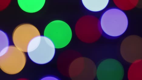 christmas blur background. shimmering colored circles defocused christmas lights video