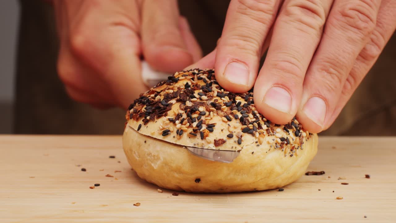 Bagel sandwich brunch, lunch plate of a bagel with smoked salmon and cream cheese and ham, close up morning cafe menu.