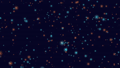 Fly-blue-and-orange-snowflakes-in-dark-blue-sky