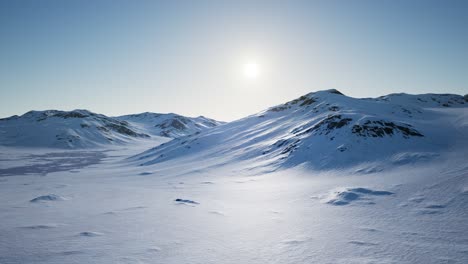 Aerial-Landscape-of-snowy-mountains-and-icy-shores-in-Antarctica