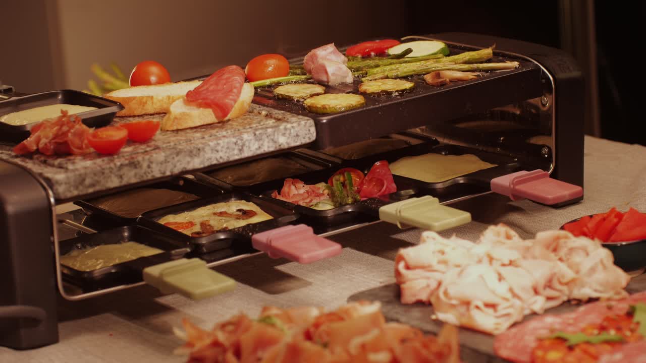 French Swiss or Spanish restaurant with traditional tapas food, Spanish cuisine, delicious tapas and cheese plate, bruschetta with cheese, olives dry tomatoes and tasty sandwich bar appetizer, buffet