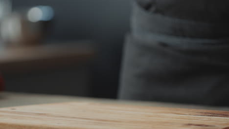 chef throwing beef on table