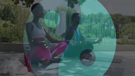 Animation-Von-Ying-Yang-Symbolen-über-Einem-Afroamerikanischen-Paar-Beim-Meditieren