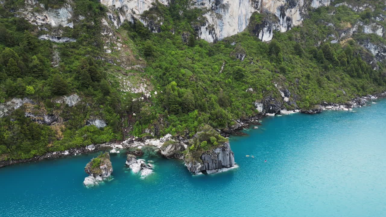 Aerial drone view of the famous marble caves of Patagonia, carved by centuries of water erosion