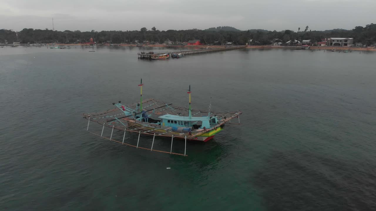 Aerial view of traditional Indonesian fishing boat near Beliting island, Indonesia