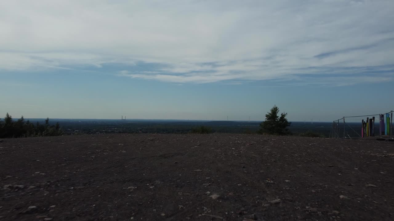 Landscape with a Person on a Hill