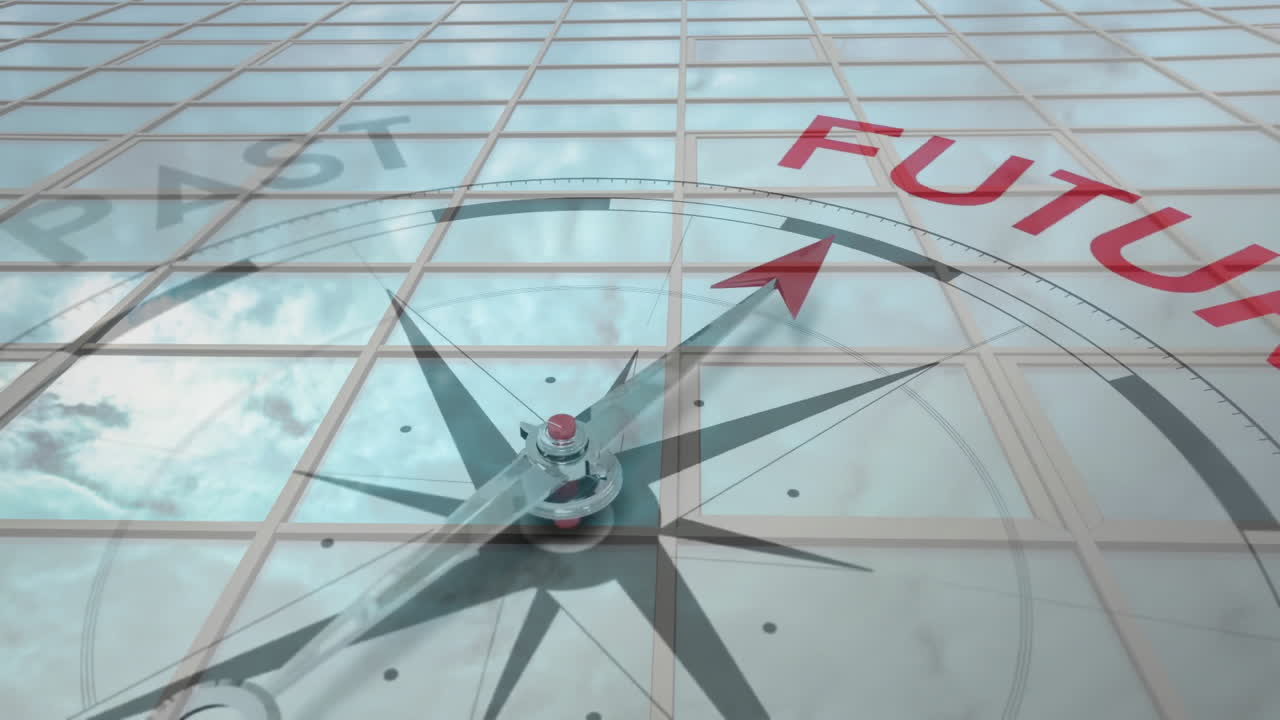 Compass pointing towards FUTURE animation over glass building reflecting sky