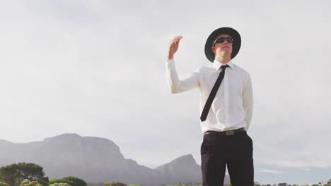 Cricket-umpire-making-signs-standing-on-a-cricket-pitch