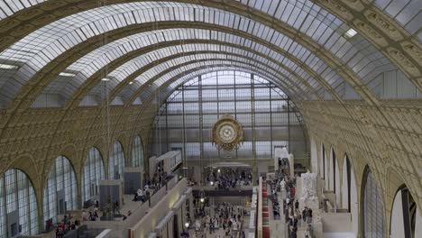 aerial shot of the interior of musée d'orsay, paris, showcasing the architecture and visitors