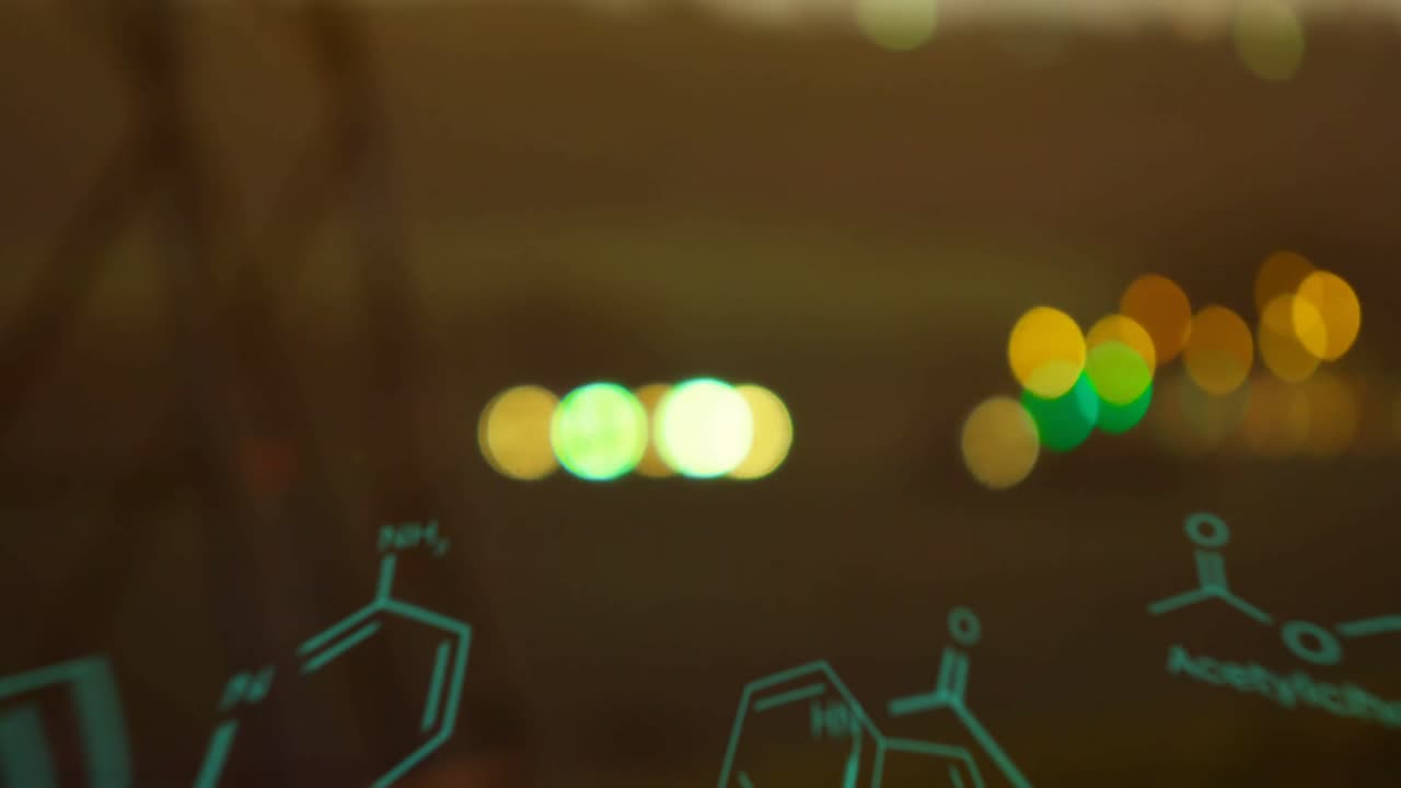 Chemical structures with program codes and a background of transmission towers with bokeh lights