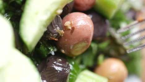 close-up of a fresh salad with olives