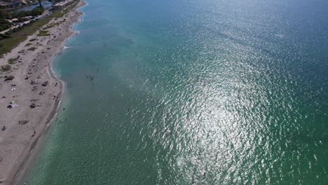 Miami-Beach-Aerial-Drone-Landing,-Perfect-Ocean-Water