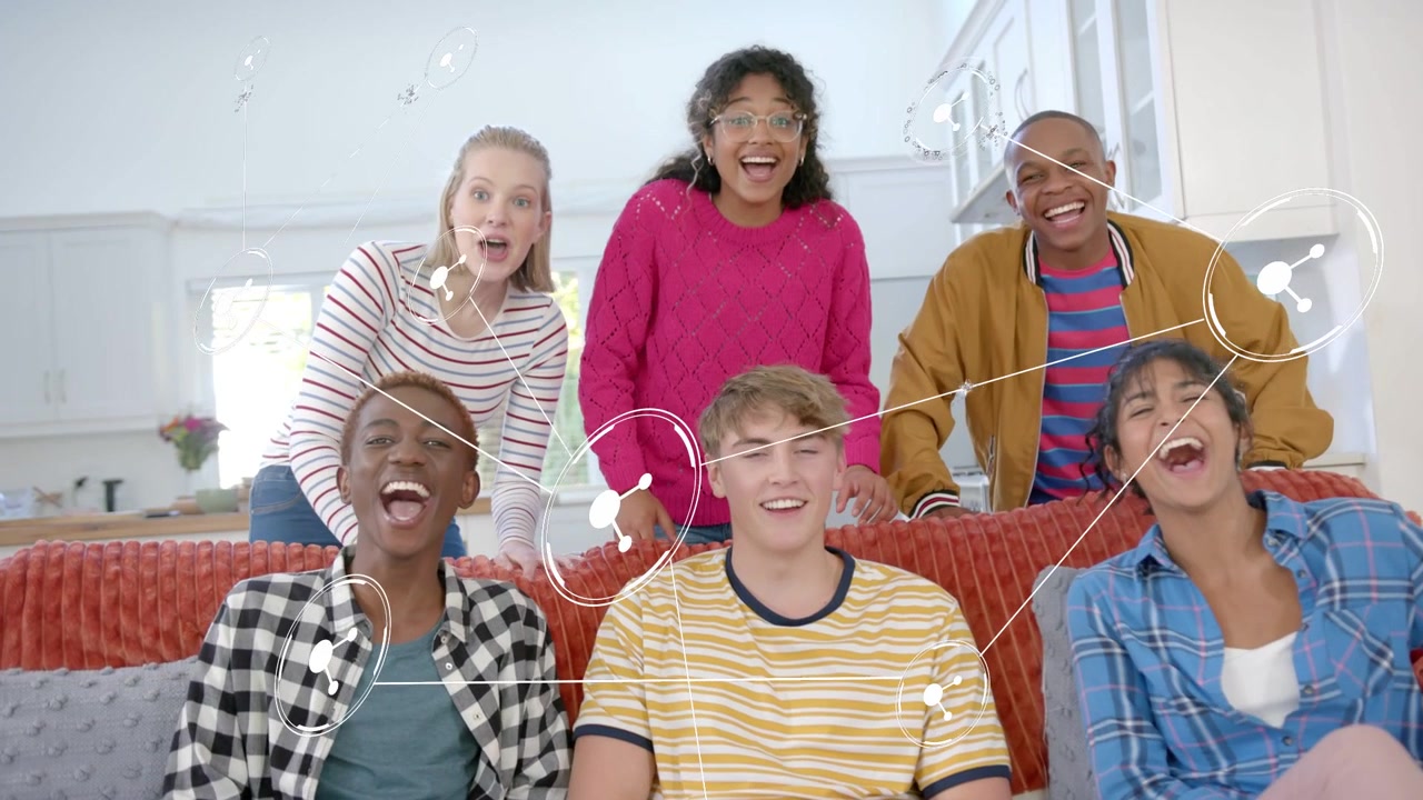 Six peers leaning and laughing on couch, reacting to white node overlay drifting left for marketing