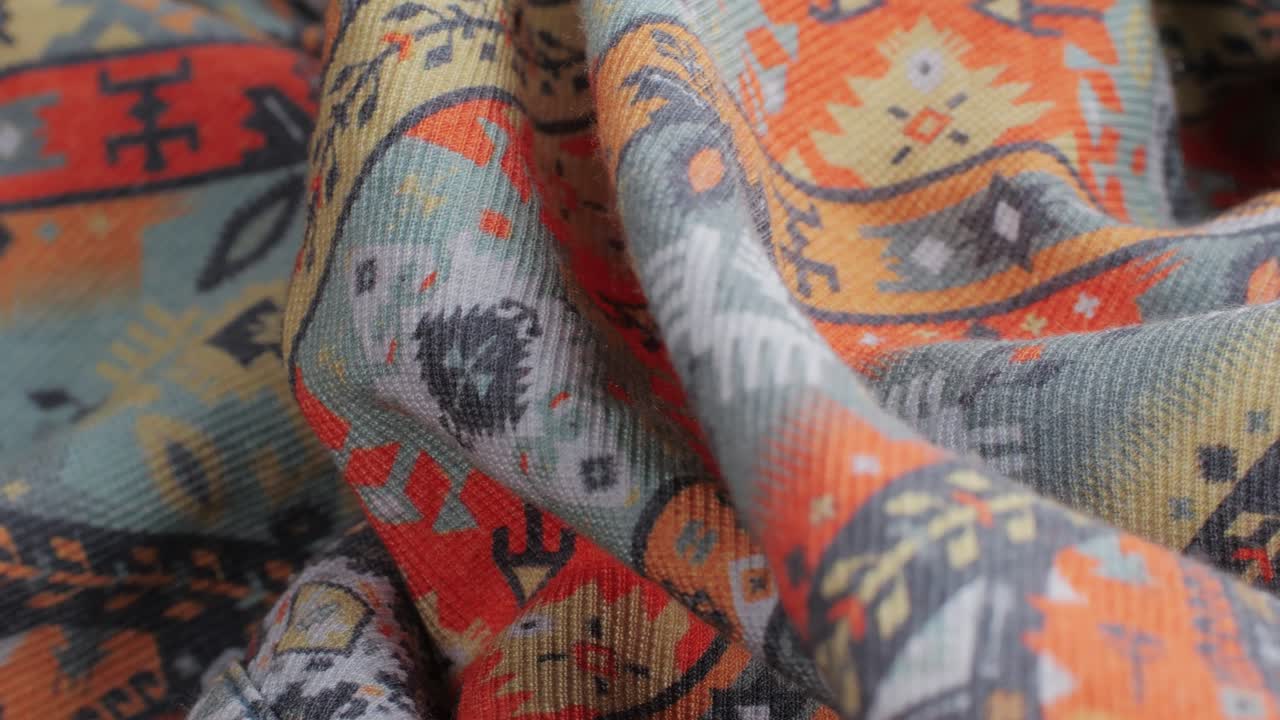 Colorful textile cloth texture close-up macro. Fashion fabric multicolor. High quality 4k footage