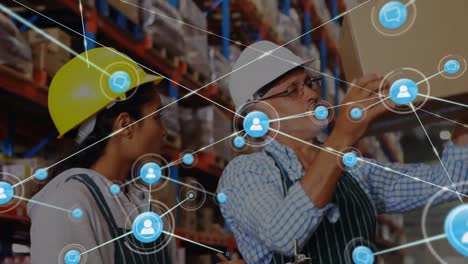 Animation-of-network-of-connections-with-icons-over-diverse-workers-in-warehouse