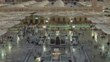 night to day morning transition time-lapse looking over the al masjid al abawi mosque in medina.