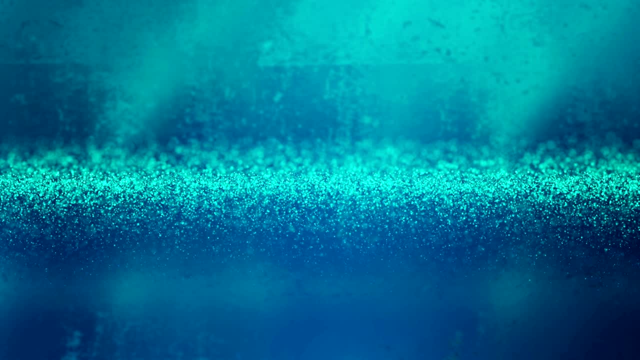 Flowing blue glittering frozen particles on icy abstract background