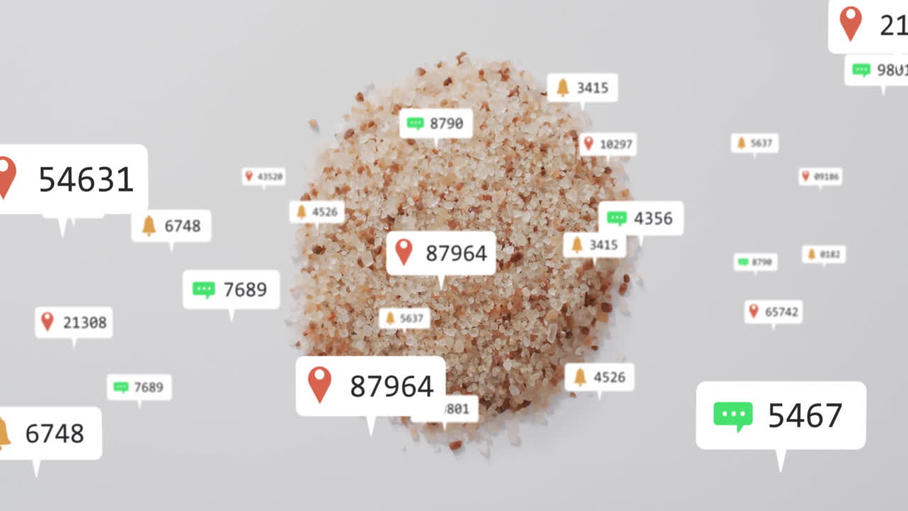 Animation showing grains of sand with data points and notifications overlaying