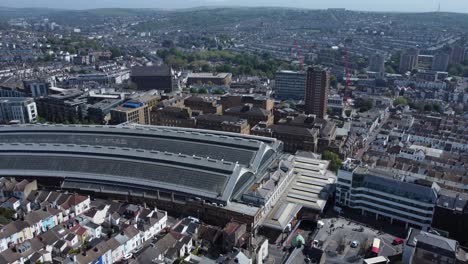 aerial view of brighton railway station revealing city and downs on a sunny day